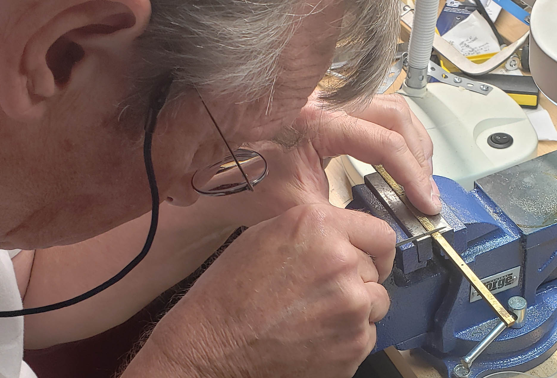 shaping the teeth with a file